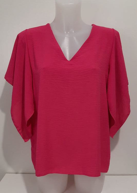 Top fluide fuchsia col V à manches papillon – coupe fluide, polyester, taille unique 36‑42, fabriqué en Italie
