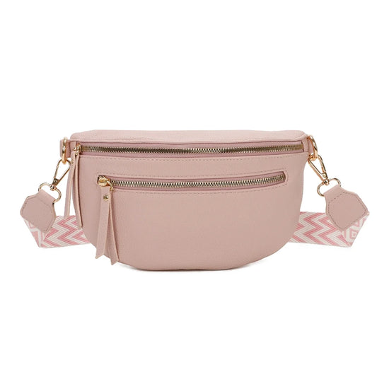 Banane Gallantry rose poudré en simili cuir grainé, avec sangle réglable à motif chevrons, fermeture zippée et poche frontale, idéale pour un look tendance et pratique