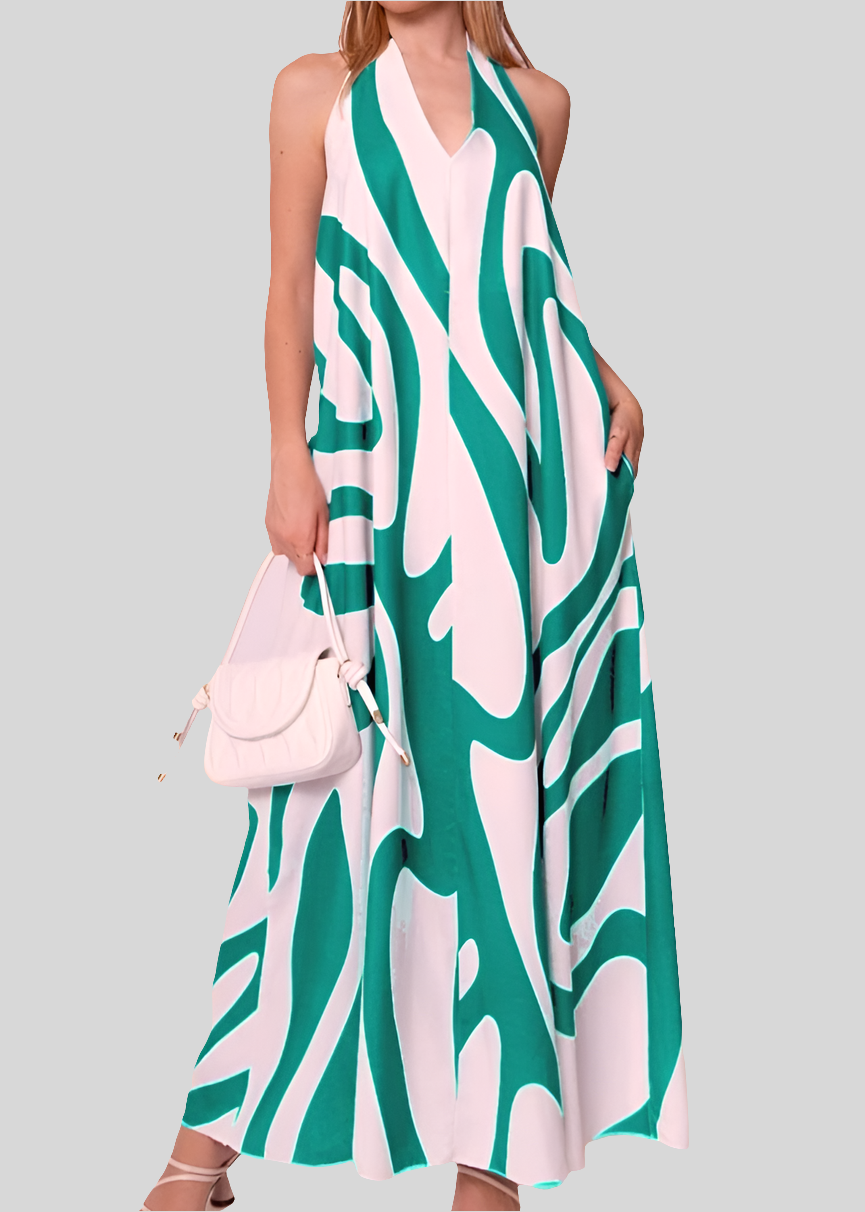 Robe longue dos-nu verte à col halter pour femme, coupe fluide avec imprimé graphique et poches, idéale pour l’été – Timalya.