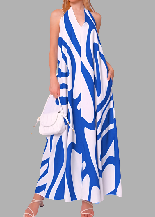 Robe dos-nu femme bleu roi imprimée, col halter et poches, style estival tendance et fluide à porter au quotidien – Timalya.