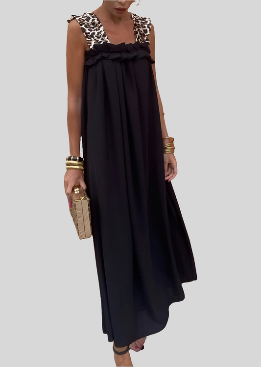 Robe longue noire à bretelles larges imprimé léopard, coupe fluide et féminine, parfaite pour un look élégant et tendance – Timalya.